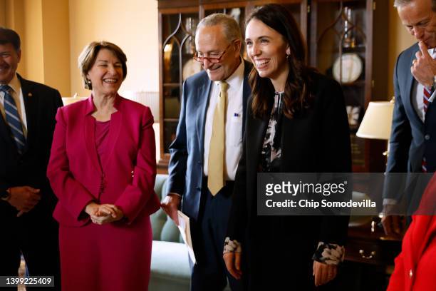 New Zealand Prime Minister Jacinda Ardern shares a laugh with Sen. Mike Rounds , Sen. Amy Klobuchar , Senate Majority Leader Charles Schumer and...