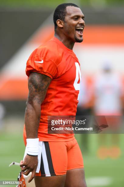 Deshaun Watson of the Cleveland Browns celebrates a play during the Cleveland Browns OTAs at CrossCountry Mortgage Campus on May 25, 2022 in Berea,...