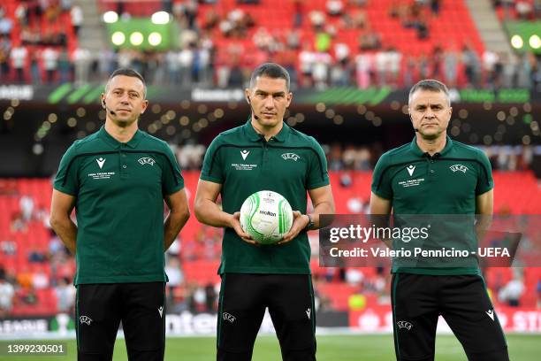 Referee Istvan Kovacs poses for a photo with the match officials Mihai-Ovidiu Artene and Vasile Florin Marinescu prior to the UEFA Conference League...