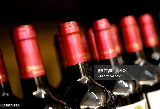 red wine is a type of wine made from dark-colored grape varieties - uva merlot imagens e fotografias de stock