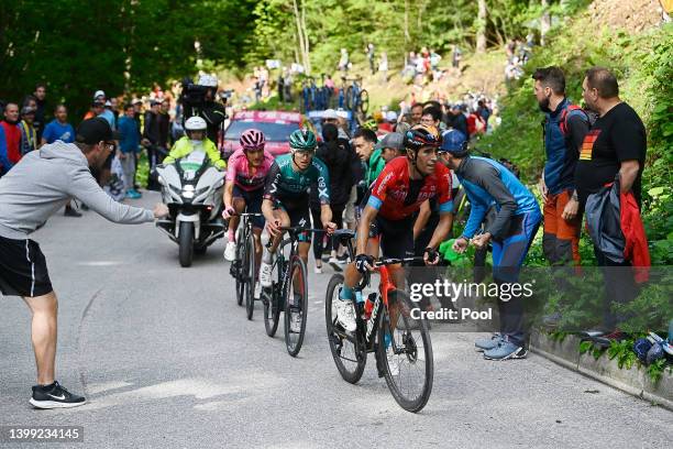 Richard Carapaz of Ecuador and Team INEOS Grenadiers Pink Leader Jersey, Jai Hindley of Australia and Team Bora - Hansgrohe and Mikel Landa Meana of...