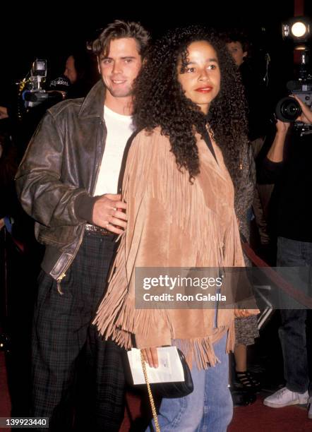 Thomas Howell and Rae Dawn Chong at the Premiere of 'U2: Rattle and Hum', Mann's Chinese Theatre, Hollywood.