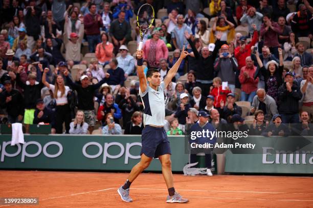 Carlos Alcaraz of Spain celebrates victory against Albert Ramos-Vinolas of Spain during the Men's Singles Round 2 on Day Four of The 2022 French Open...