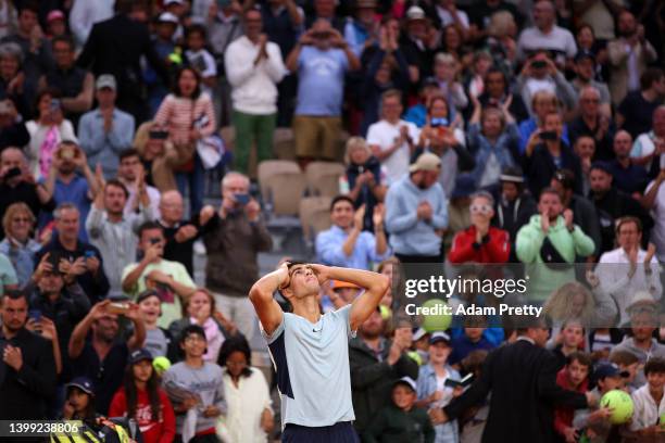 Carlos Alcaraz of Spain celebrates victory against Albert Ramos-Vinolas of Spain during the Men's Singles Round 2 on Day Four of The 2022 French Open...