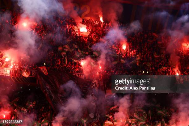 Feyenoord fans hold flares inside the stadium prior to the UEFA Conference League final match between AS Roma and Feyenoord at Arena Kombetare on May...
