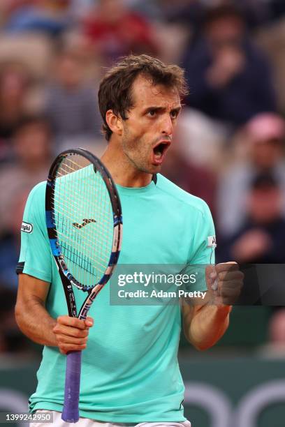 Albert Ramos-Vinolas of Spain reacts against Carlos Alcaraz of Spain during the Men's Singles Round 2 on Day Four of The 2022 French Open at Roland...