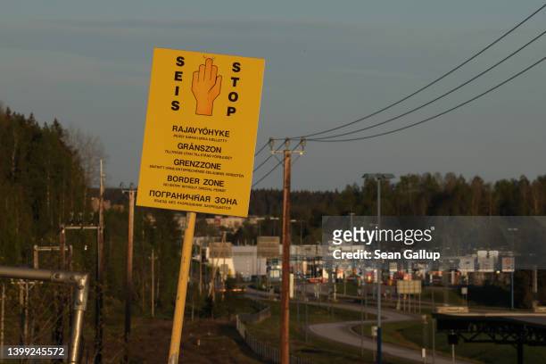 Sign warns visitors not to proceed further near the Imatra border crossing between Finland and Russia on May 24, 2022 near Imatra, Finland....