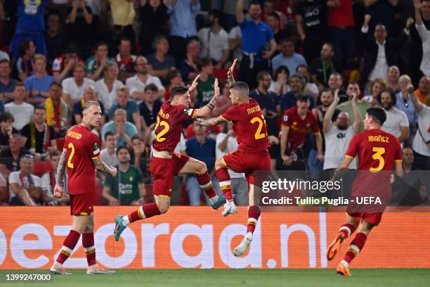 Nicolo Zaniolo of AS Roma celebrates with team mate Gianluca Mancini after scoring their sides first goal during the UEFA Conference League final...