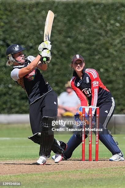 Elizabeth Perry of New Zealand hits to the onside during the International Twenty20 match between New Zealand and England at Queens Park on February...