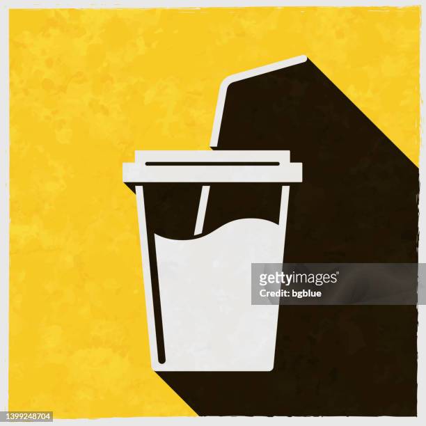 cup with straw. icon with long shadow on textured yellow background - coffee take away cup simple stock illustrations