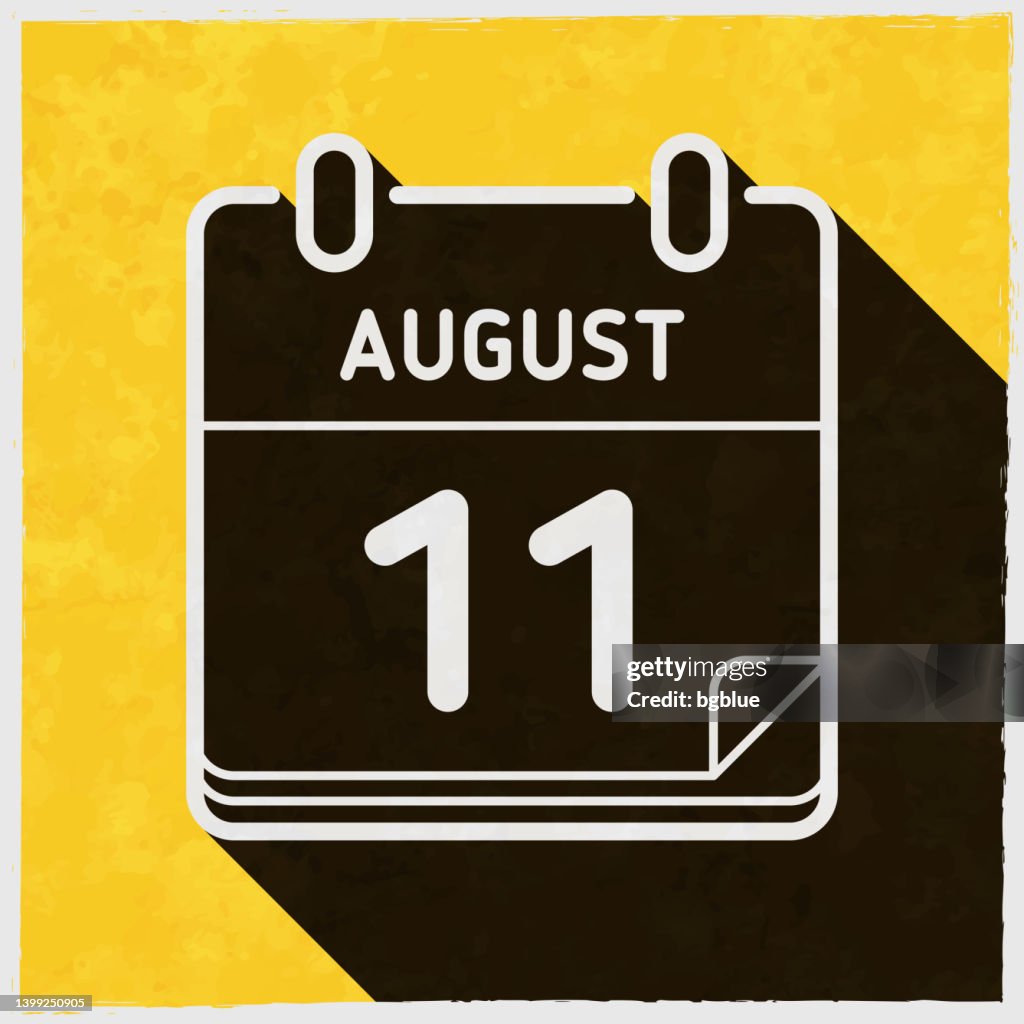 August 11. Icon with long shadow on textured yellow background