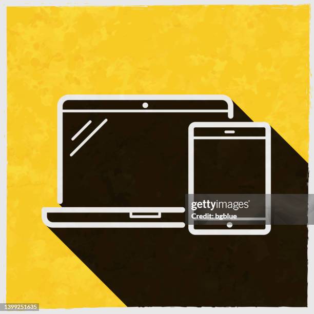 laptop and tablet pc. icon with long shadow on textured yellow background - phone screen texture stock illustrations