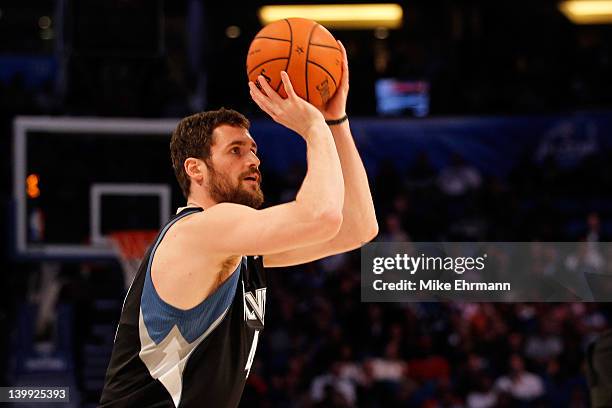 Kevin Love of the Minnesota Timberwolves competes during the Foot Locker Three-Point Contest part of 2012 NBA All-Star Weekend at Amway Center on...