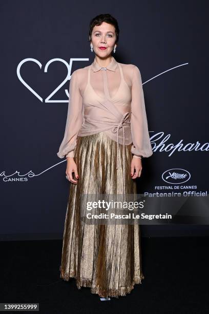 Maggie Gyllenhaal wearing Chopard attends the "Chopard Loves Cinema" Gala Dinner at Hotel Martinez on May 25, 2022 in Cannes, France.