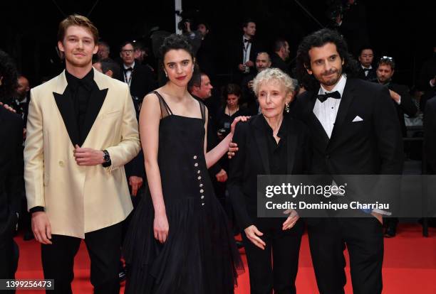 Joe Alwyn, Margaret Qualley, Claire Denis and Nick Romano attend the screening of "Stars At Noon" during the 75th annual Cannes film festival at...