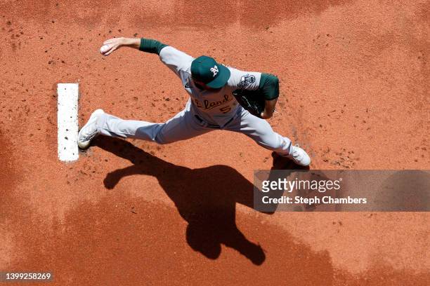Paul Blackburn of the Oakland Athletics warms up before the game in the bullpen against the Seattle Mariners at T-Mobile Park on May 25, 2022 in...