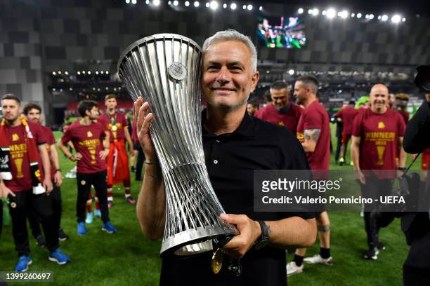 Jose Mourinho, Head Coach of AS Roma lifts the UEFA Europa Conference League Trophy after their sides victory during the UEFA Conference League final...