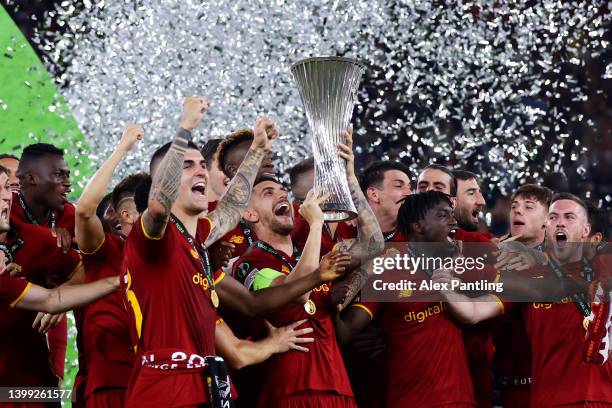 Lorenzo Pellegrini of AS Roma lifts the UEFA Europa Conference League Trophy after their sides victory during the UEFA Conference League final match...