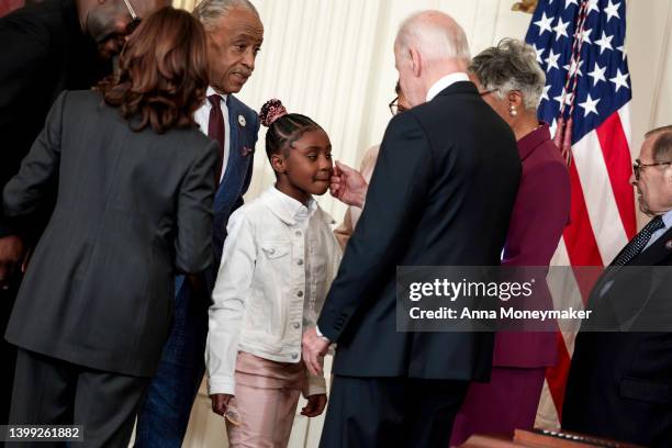 President Joe Biden and U.S. Vice President Kamala Harris speaks to Gianna Floyd, the daughter of George Floyd, after an executive order signing...