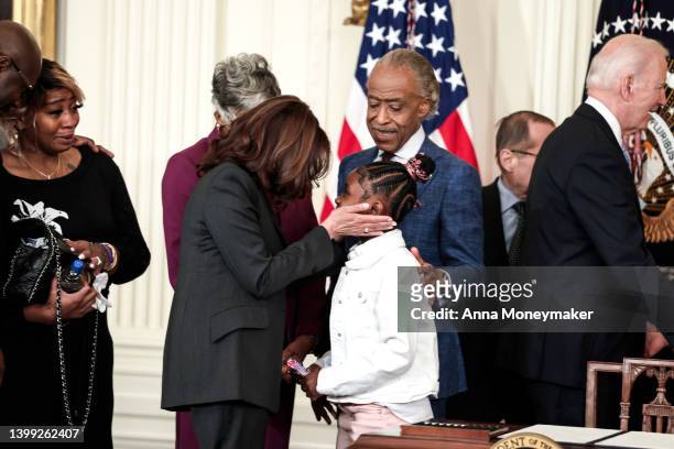 Vice President Kamala Harris speaks to Gianna Floyd, the daughter of George Floyd, after an executive order signing event enacting further police...