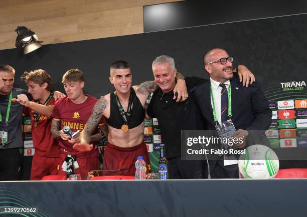 Head coach of AS Roma Jose Mourinho and Gianluca Mancini celebrates in the post match press conference after their sides victory during the UEFA...