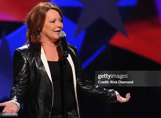 Comedian Kathleen Madigan performs as part of CMT Presents Ron White's Comedy Saltue To The Troops at The Grand Ole Opry on February 21, 2012 in...