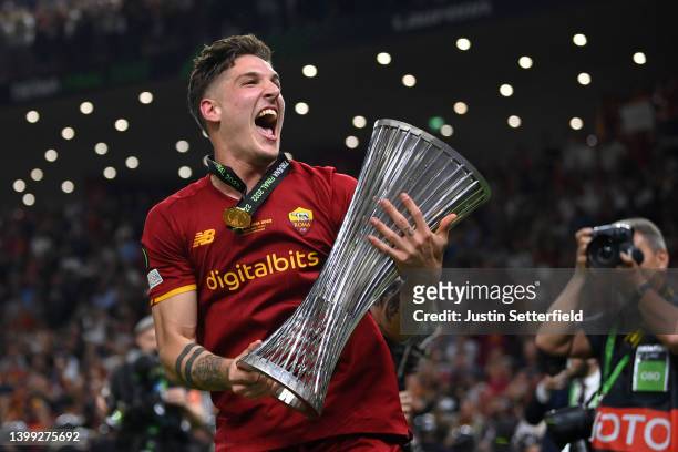 Nicolo Zaniolo of AS Roma celebrates with the UEFA Europa Conference League Trophy after their sides victory during the UEFA Conference League final...