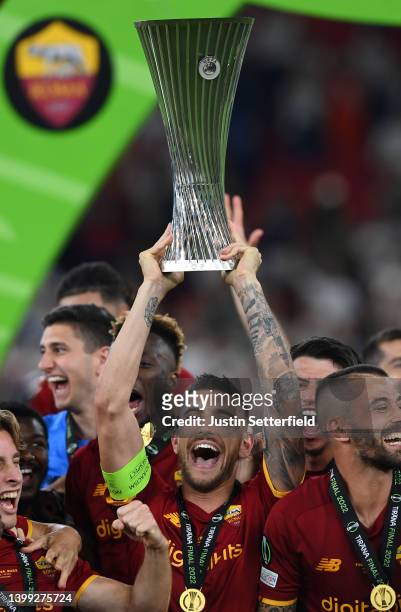 Lorenzo Pellegrini of AS Roma lifts the UEFA Europa Conference League Trophy after their sides victory during the UEFA Conference League final match...