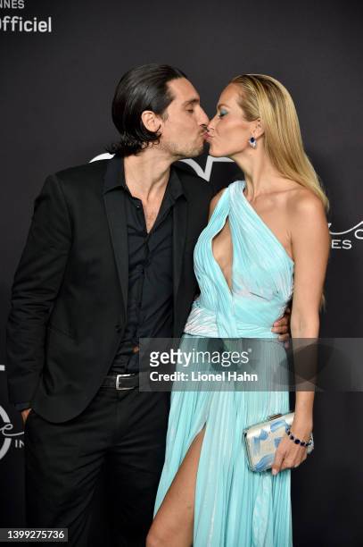 Benjamin Larretche and Petra Němcová attend the "Chopard Loves Cinema" Gala Dinner at Hotel Martinez on May 25, 2022 in Cannes, France.