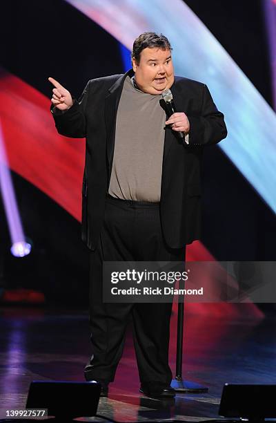 Comedian John Pinette performs as part of CMT Presents Ron White's Comedy Saltue To The Troops at The Grand Ole Opry on February 21, 2012 in...