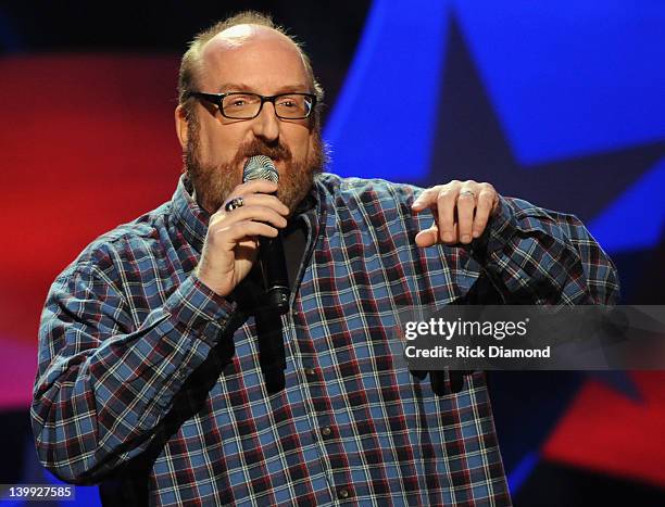 Comedian Brian Posehn performs as part of CMT Presents Ron White's Comedy Saltue To The Troops at The Grand Ole Opry on February 21, 2012 in...