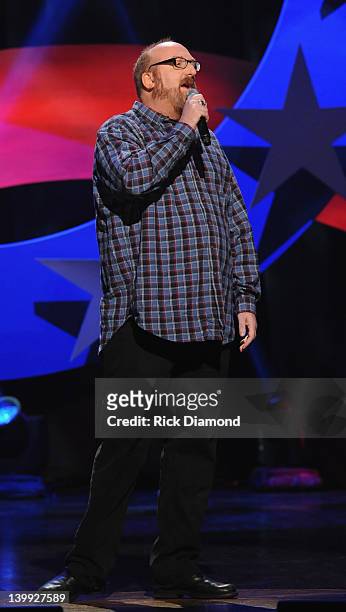 Comedian Brian Posehn performs as part of CMT Presents Ron White's Comedy Saltue To The Troops at The Grand Ole Opry on February 21, 2012 in...