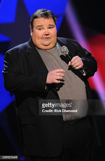 Comedian John Pinette performs as part of CMT Presents Ron White's Comedy Saltue To The Troops at The Grand Ole Opry on February 21, 2012 in...