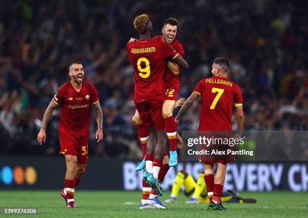 Tammy Abraham celebrates with team mate Stephan El Shaarawy of AS Roma at the full time whistle during the UEFA Conference League final match between...