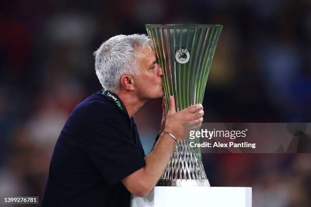 Jose Mourinho, Manager of AS Roma celebrates with the trophy after the full-time whistle during the UEFA Conference League final match between AS...