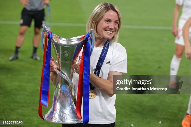 Sonia Bompastor Head coach of Lyon poses with the trophy following the UEFA Women's Champions League final match between FC Barcelona and Olympique...