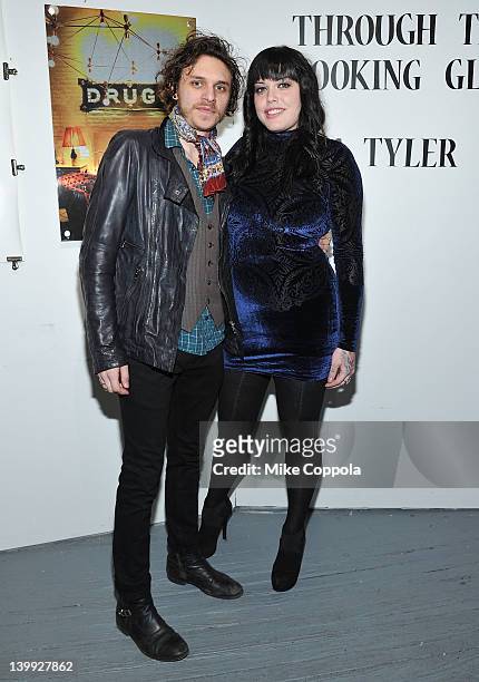 Musician Jesse Kotansky and actress/model Mia Tyler attend the Art Photography of Mia Tyler exhibit at RIFF's WTF Saturday on February 25, 2012 in...