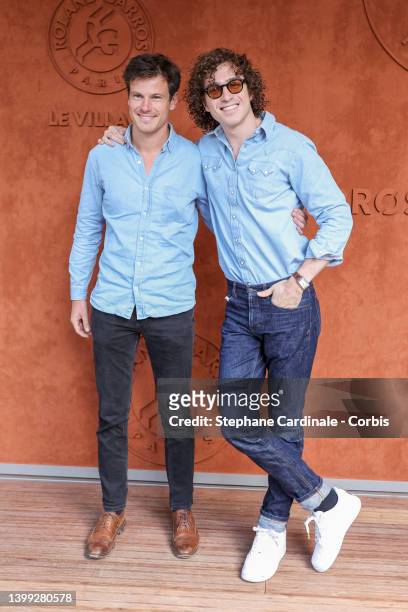 Guest and Cesar De Rummel from band Ofenbach at Roland Garros on May 25, 2022 in Paris, France.