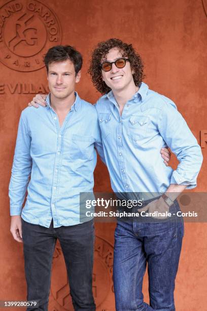 Guest and Cesar De Rummel from band Ofenbach at Roland Garros on May 25, 2022 in Paris, France.