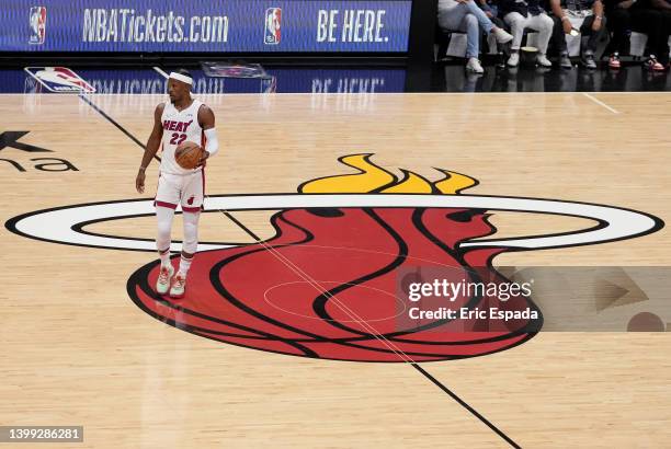 Jimmy Butler of the Miami Heat looks on from half court against the Boston Celtics during the first quarter in Game Five of the 2022 NBA Playoffs...