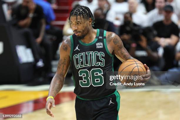 Marcus Smart of the Boston Celtics looks on against the Miami Heat during the third quarter in Game Five of the 2022 NBA Playoffs Eastern Conference...