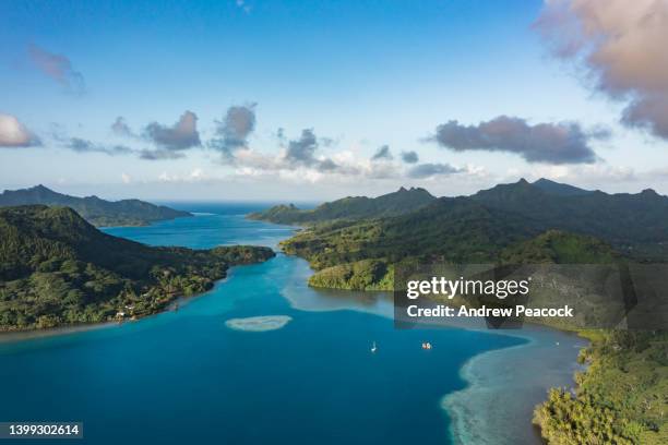 an aerial view of port bourayne, huahine. - franse overzeese gebieden stockfoto's en -beelden