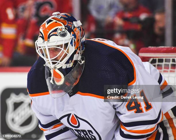 Mike Smith of the Edmonton Oilers in action against the Calgary Flames during Game Two of the Second Round of the 2022 Stanley Cup Playoffs at...