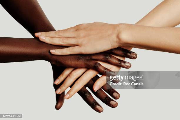 united hands - human rights watch stock pictures, royalty-free photos & images