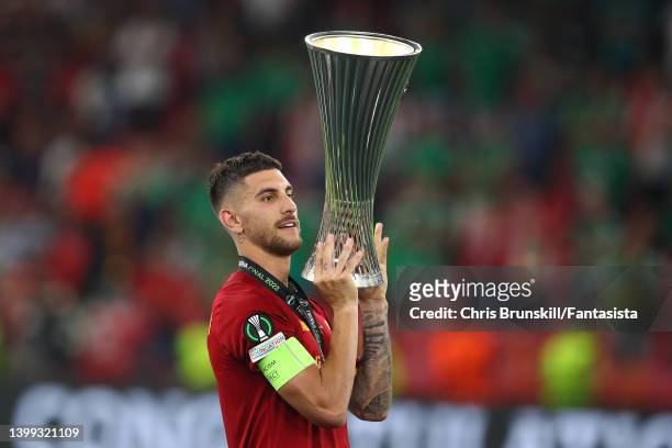 Lorenzo Pellegrini of AS Roma lifts the trophy following the UEFA Conference League final match between AS Roma and Feyenoord at Arena Kombetare on...