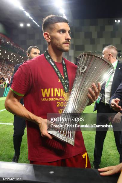 Lorenzo Pellegrini of AS Roma holds the trophy following the UEFA Conference League final match between AS Roma and Feyenoord at Arena Kombetare on...