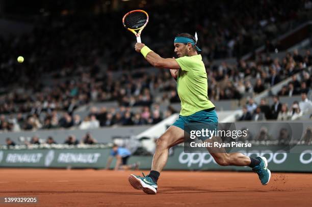 Rafael Nadal of Spain plays a forehand against Corentin Moutet of France during the Men's Singles Round 2 on Day Four of The 2022 French Open at...