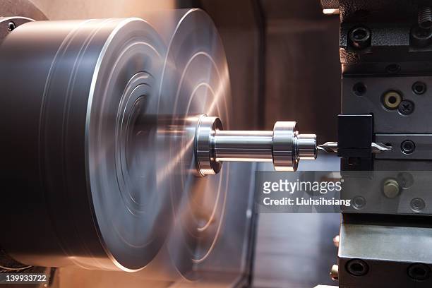 cnc lathe drilling - cnc maschine stock pictures, royalty-free photos & images