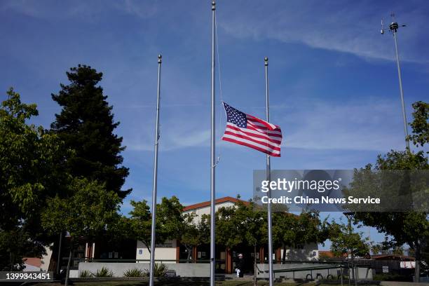 National flag flies at half-staff outside the City Hall of Millbrae after a gunman in Texas killed at least 19 children and two adults at Robb...