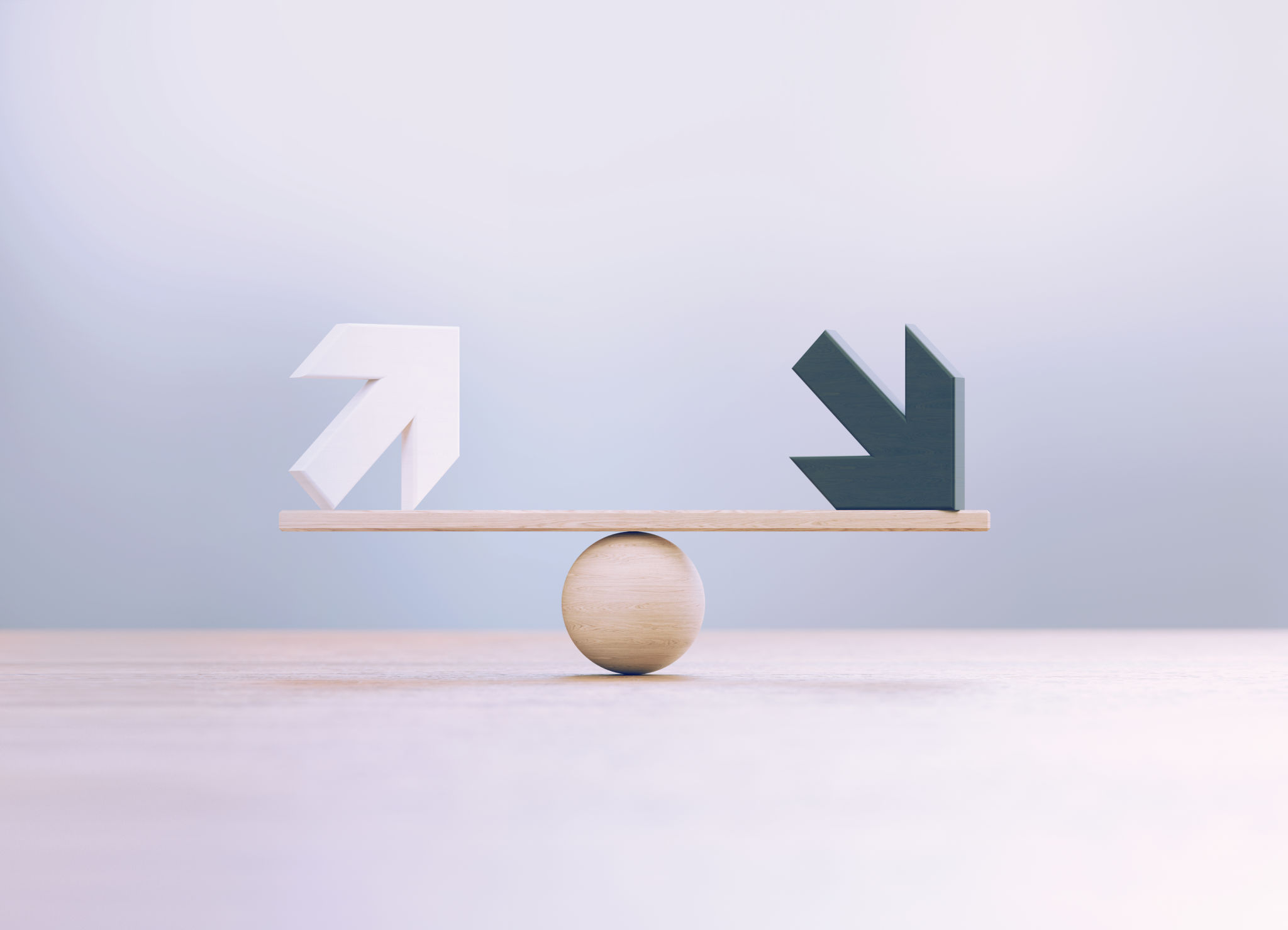 White And Black Wooden Arrow Symbols Sitting Over Wooden Seesaw Scale Before Defocused Background White And Black Wooden Arrow Symbols Sitting Over Wooden Seesaw Scale Before Defocused Background